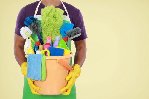 Carpet cleaning technician preparing equipment before a service booking