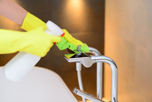 Soft washing a façade to remove algae and grime in Fulham