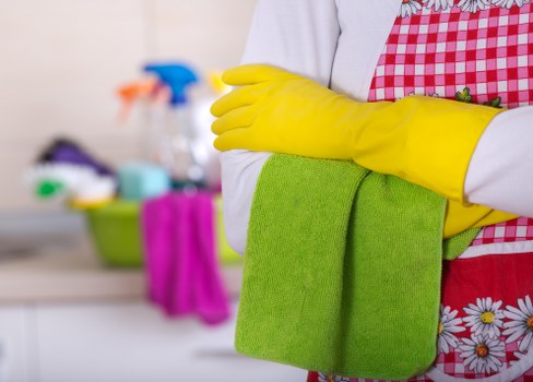 Cleaning team managing service timing and access arrangements